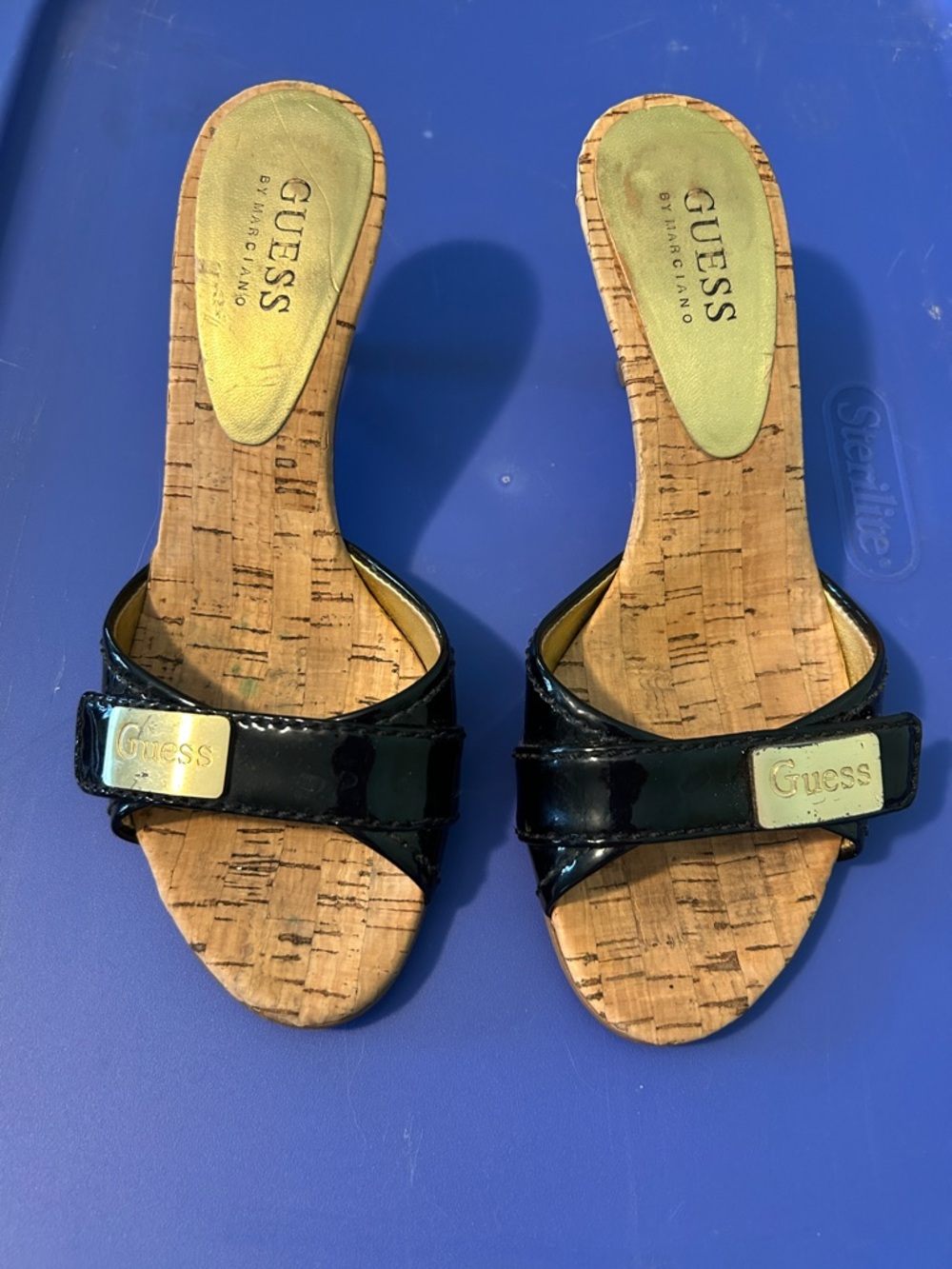 GUESS Black Patent Cork Slide Mules with Gold Logo Plaque